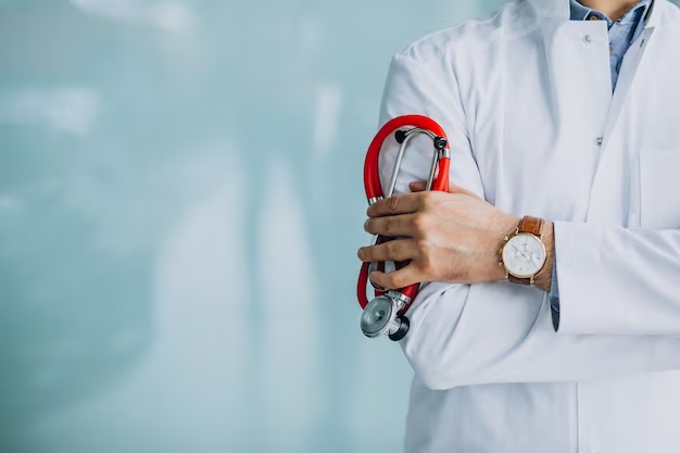 Person in a medical suit holding a stethoscope.